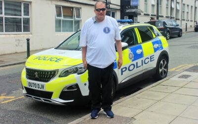 Dedicated fundraiser Andy completes 10k challenge for COPS