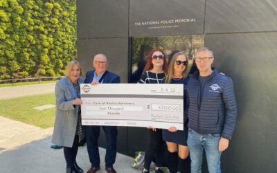 Blue Light Cycling Club celebrate first year, donate £2,000 to COPS